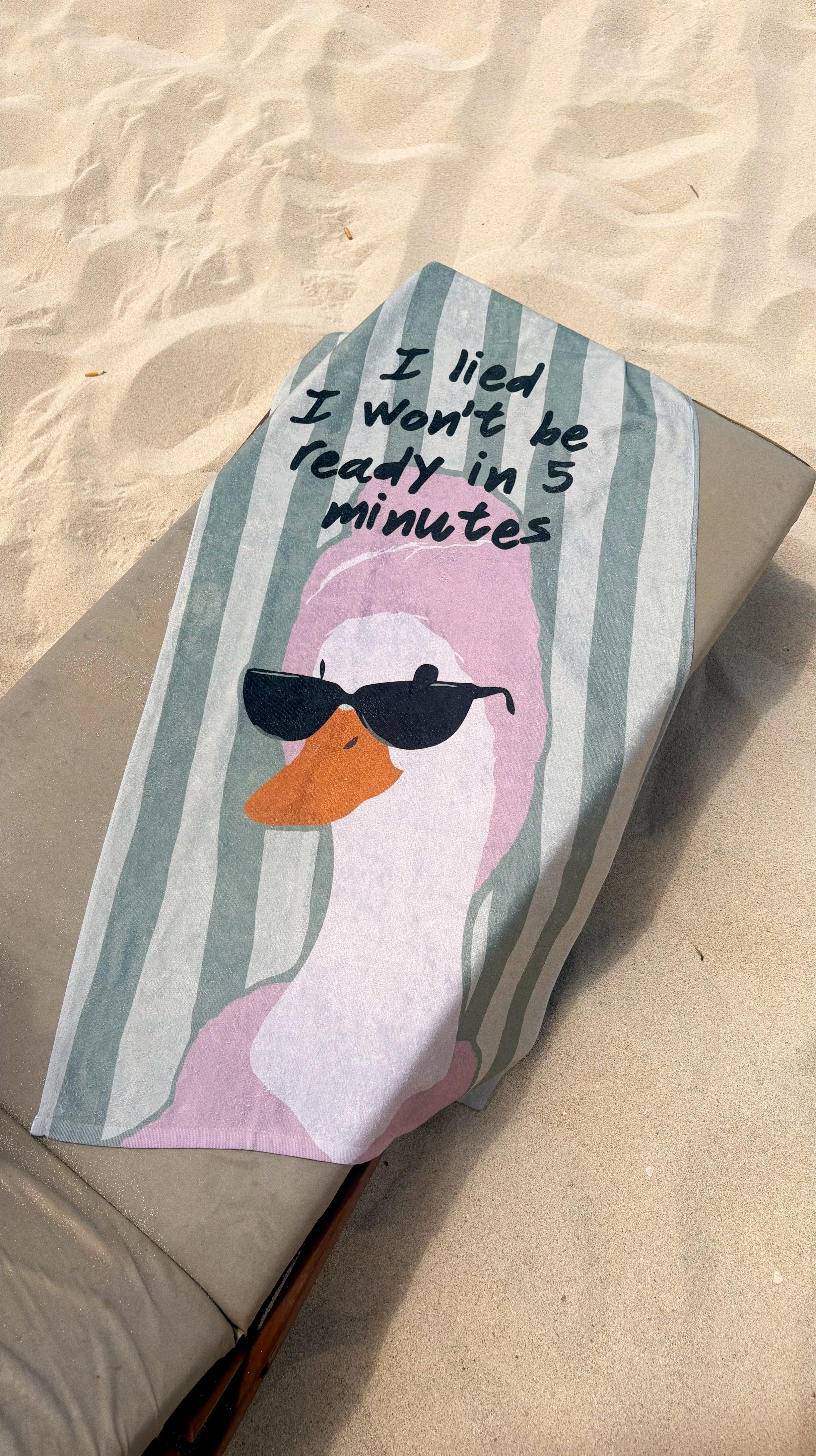Late Duck Beach Towel